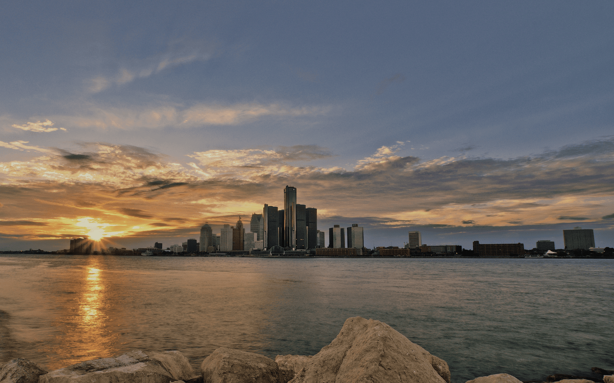 A beautiful city with high buildings and a beautiful sunset